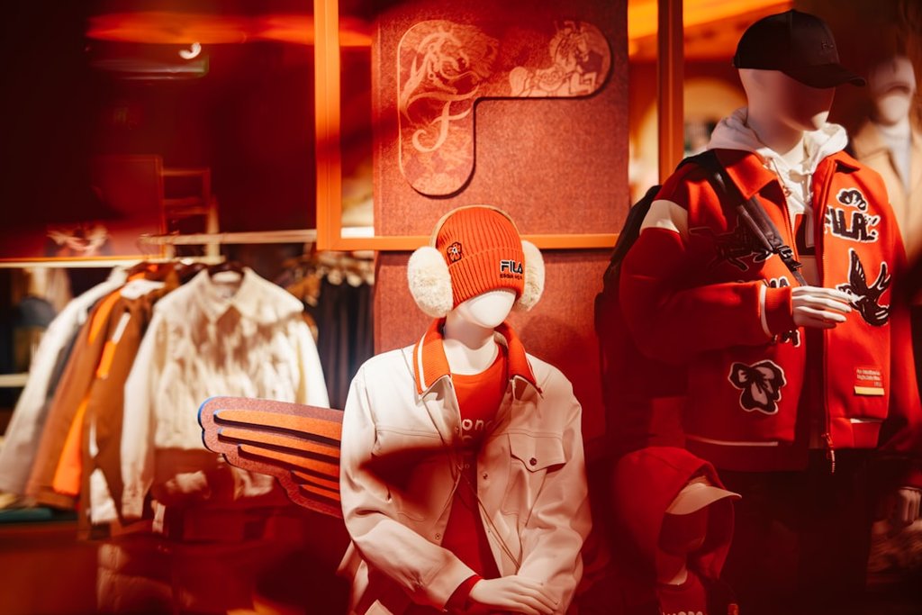 Baseball - Mannequins display casual winter clothing in a store.